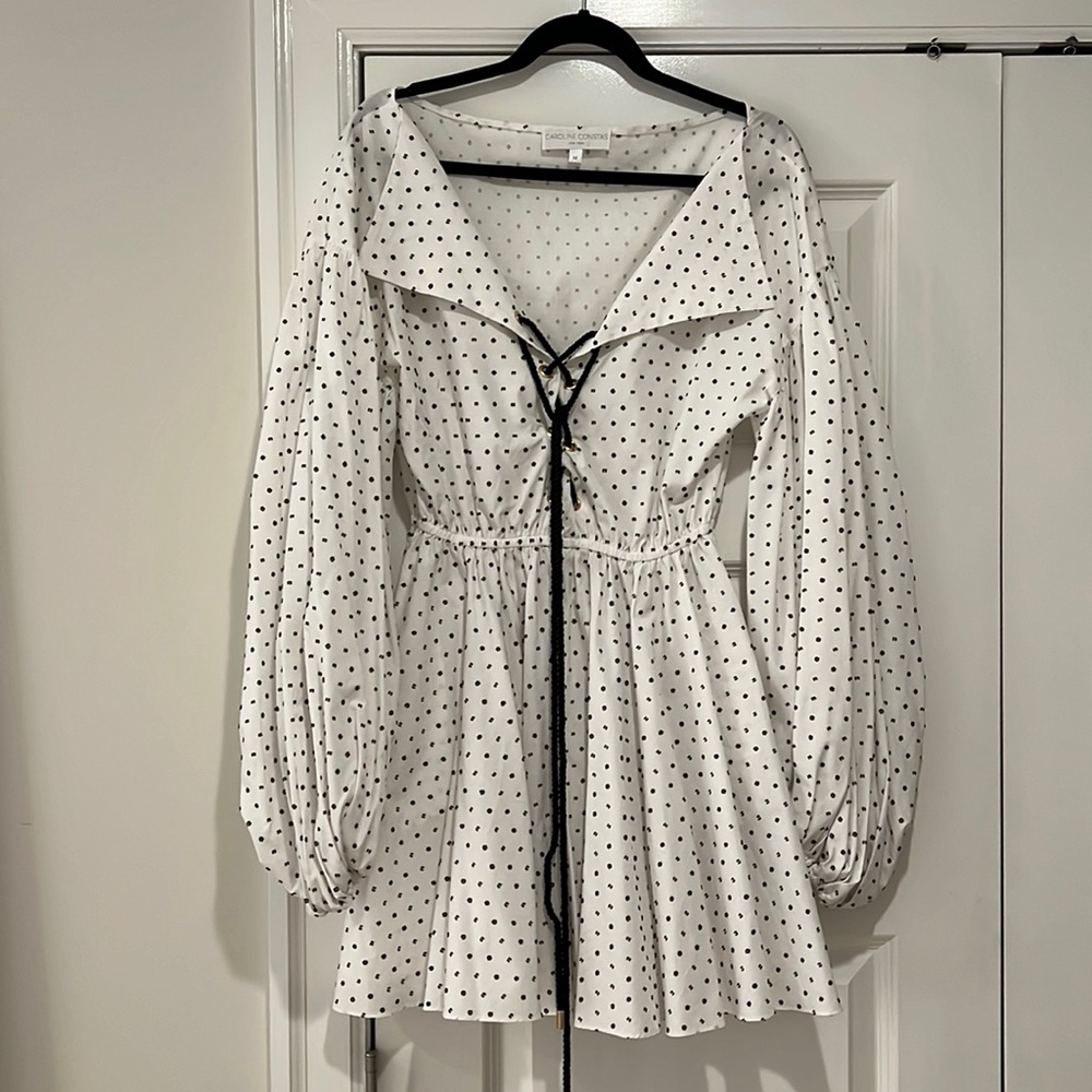 Caroline constas size M white with black polka dots, puff sleeve